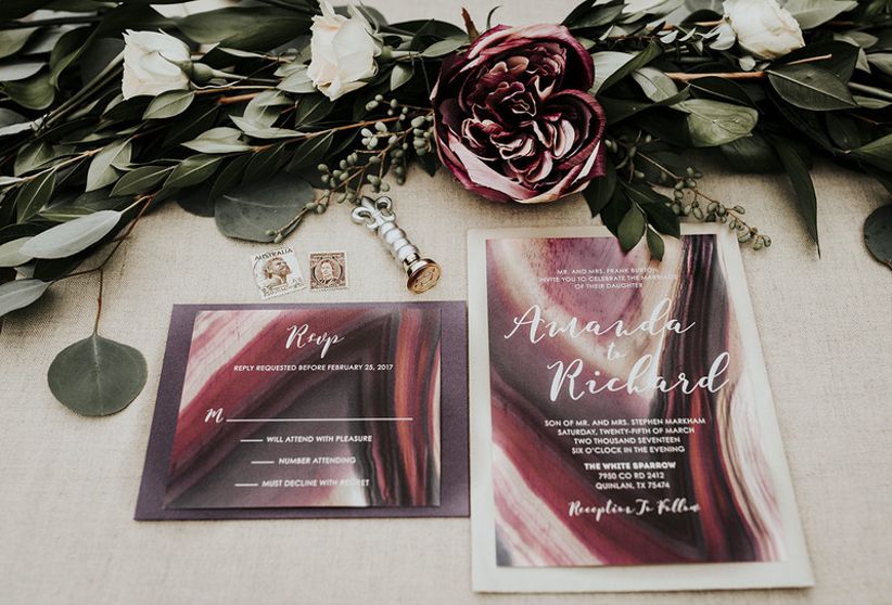 moody and dramatic wedding invitations with dark purple and burgundy marble design